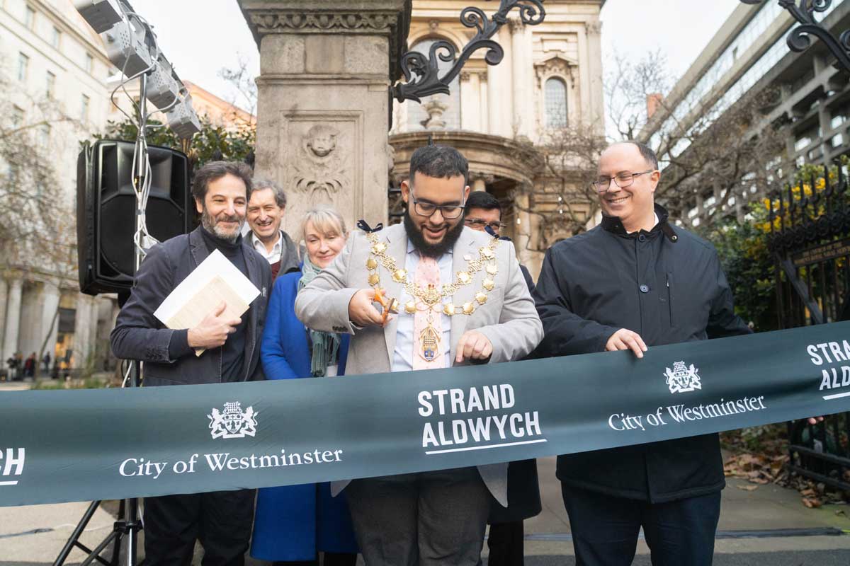 Westminster City's Lord Mayor Hamza Taouzzale cutting ribbon for the Strand Aldwych opening