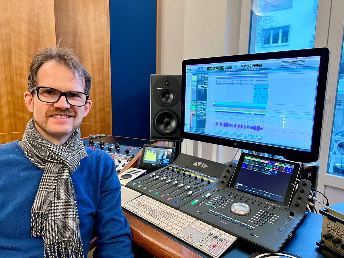 Music producer Stevan Krakovic in front of his recording studio mixing console