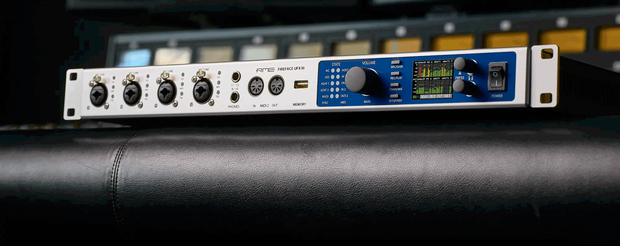 RME Fireface UFX III audio interface on a mixing console