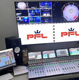 Calrec Type R console in front of large screen monitoring for Professional Fighters League