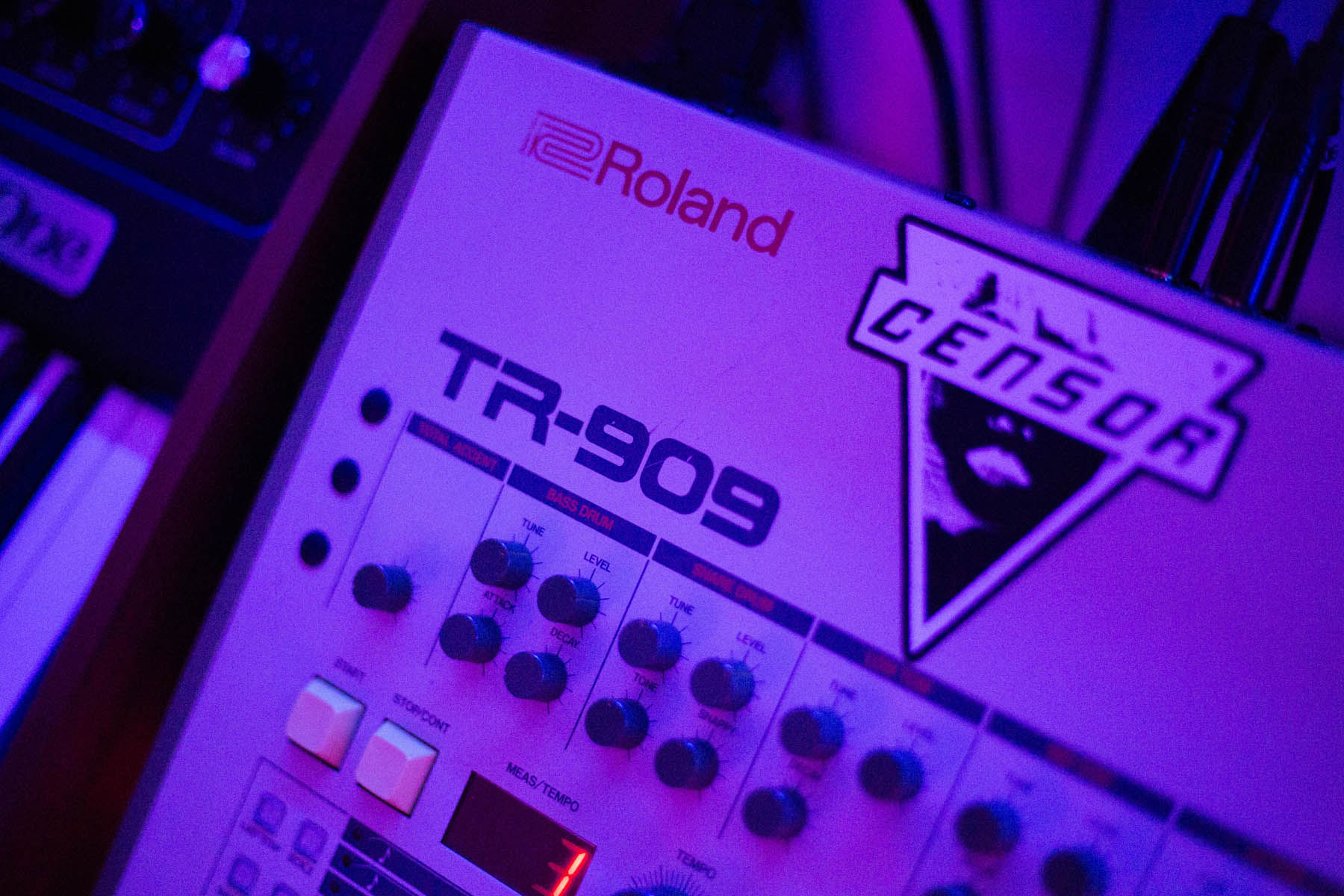 Closeup of a Roland TR-909 with Censor Records sticker