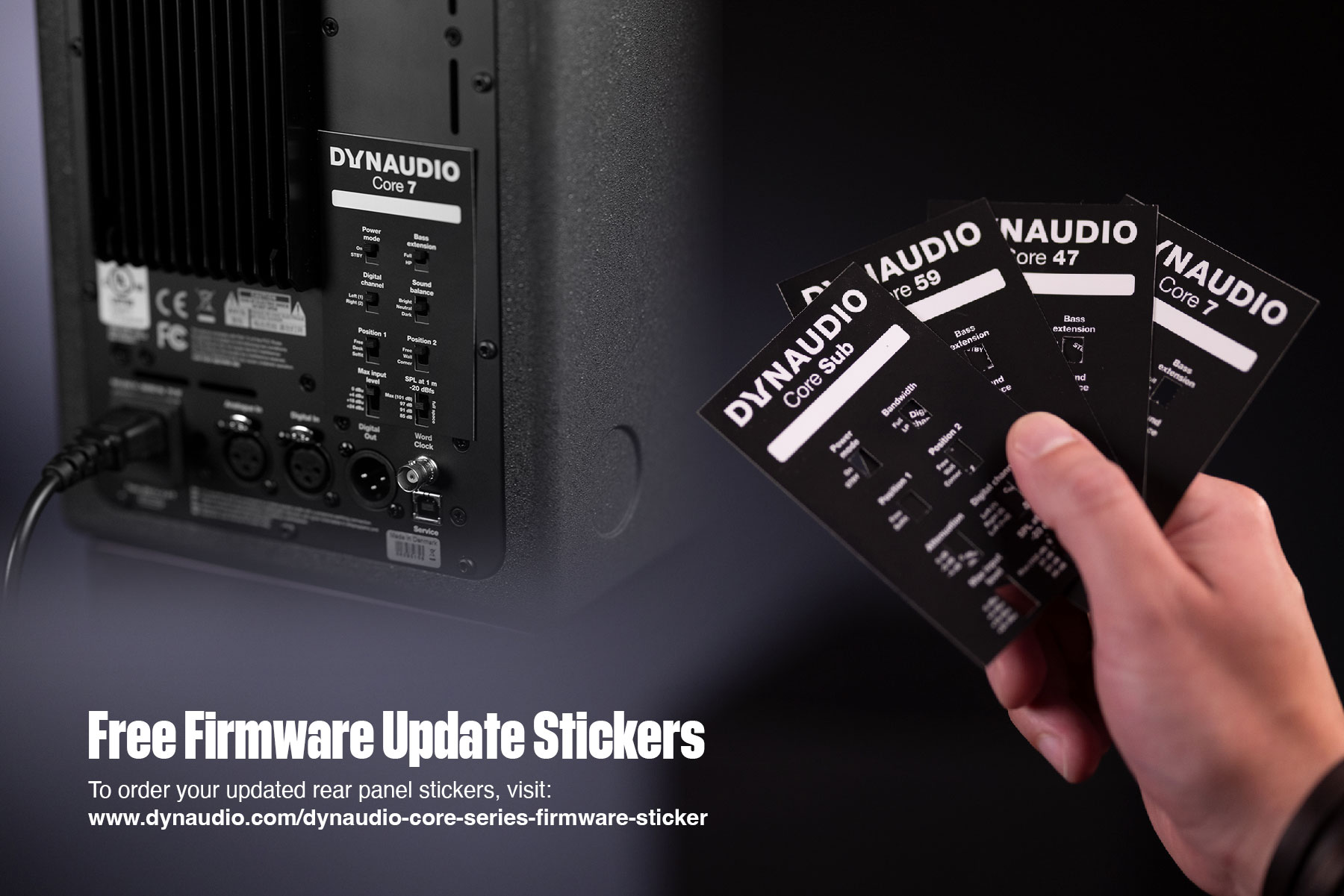 Dynaudio Core 7 rear panel closeup with hand holding stickers
