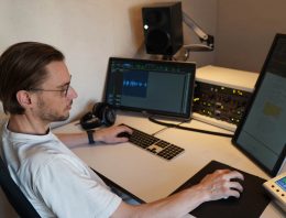 Recording engineer Tommi Schneefuss at his studio desk