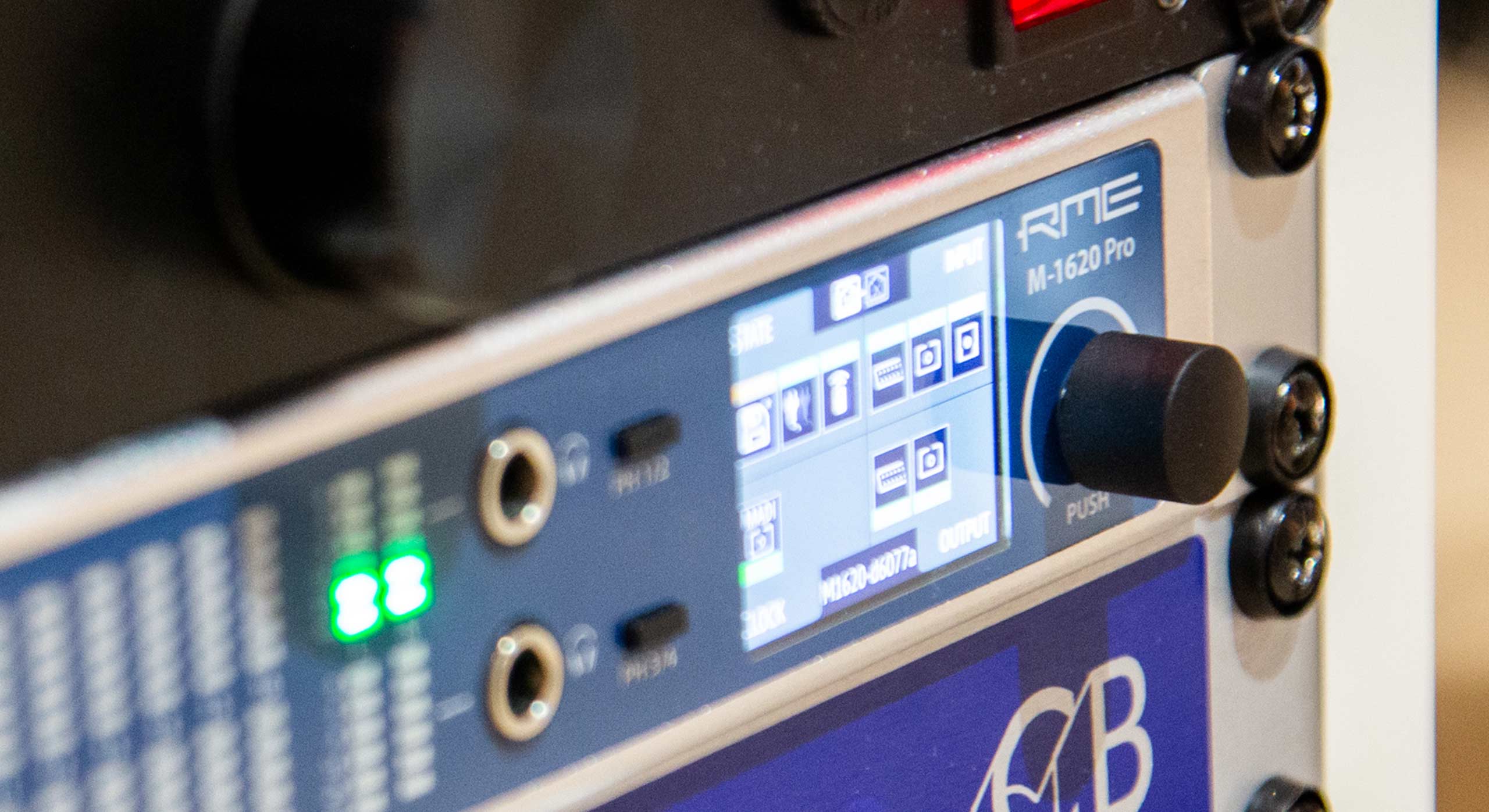 Closeup of the RME M-1620 Pro-D converter in a studio rack