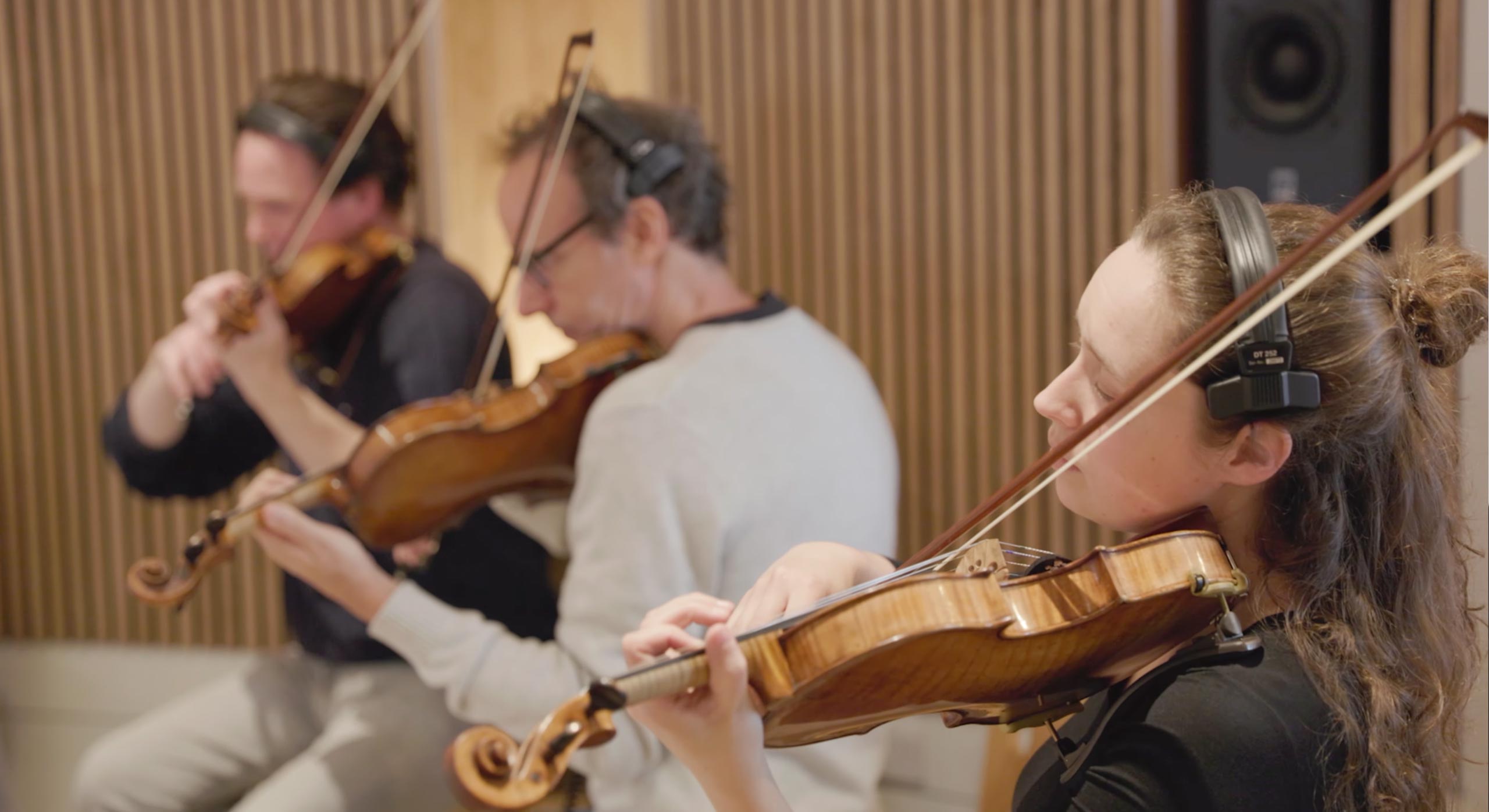 Three violinists recording at Studio Recording Works