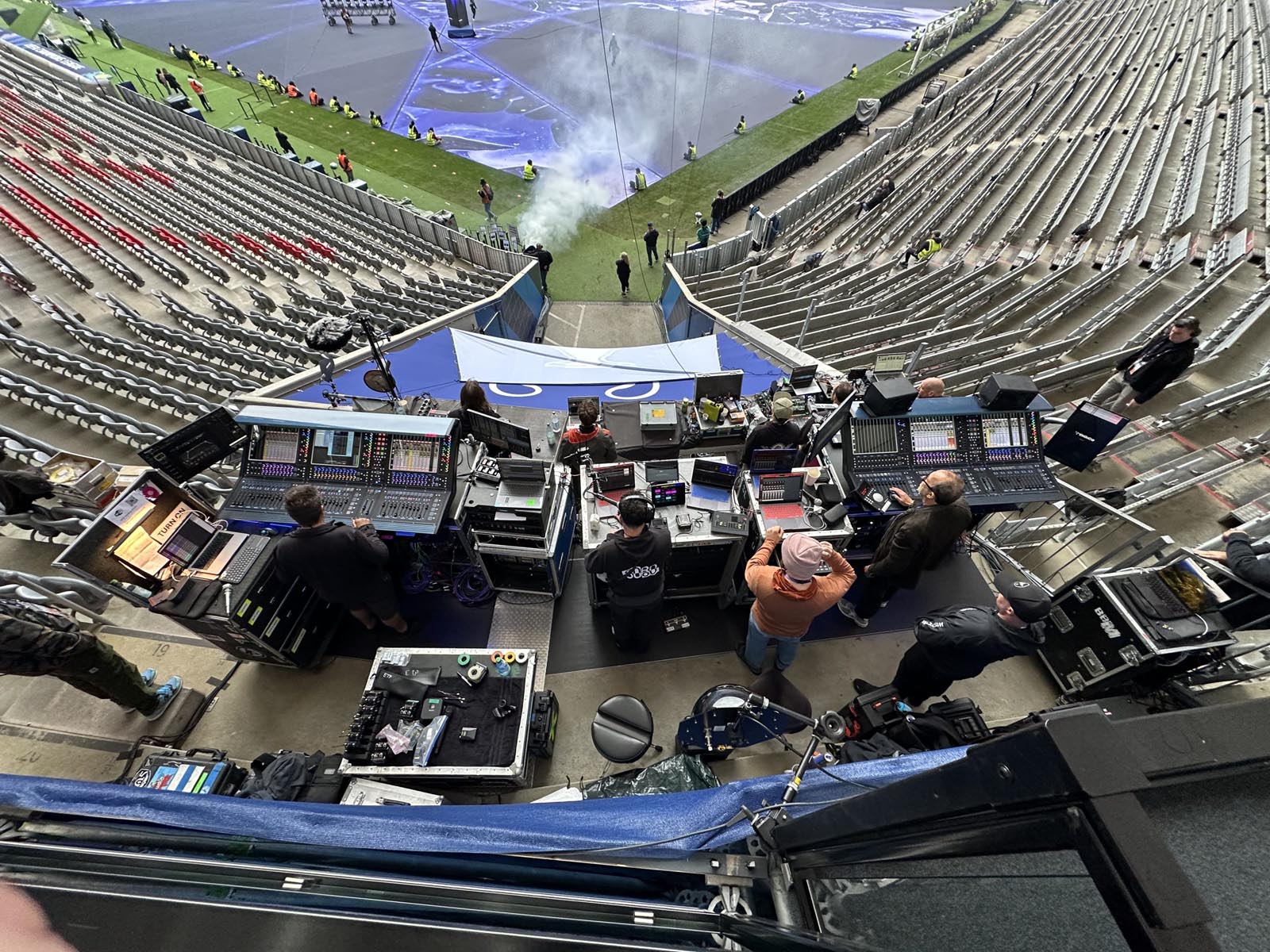 Top-down view of FOH crew at the edge of a stadium for Linkin Park tour