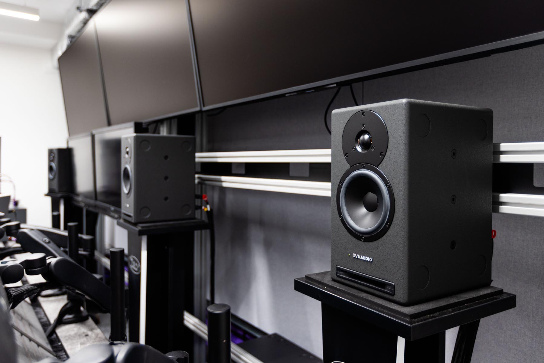 Dynaudio Core 5 studio monitors on stands